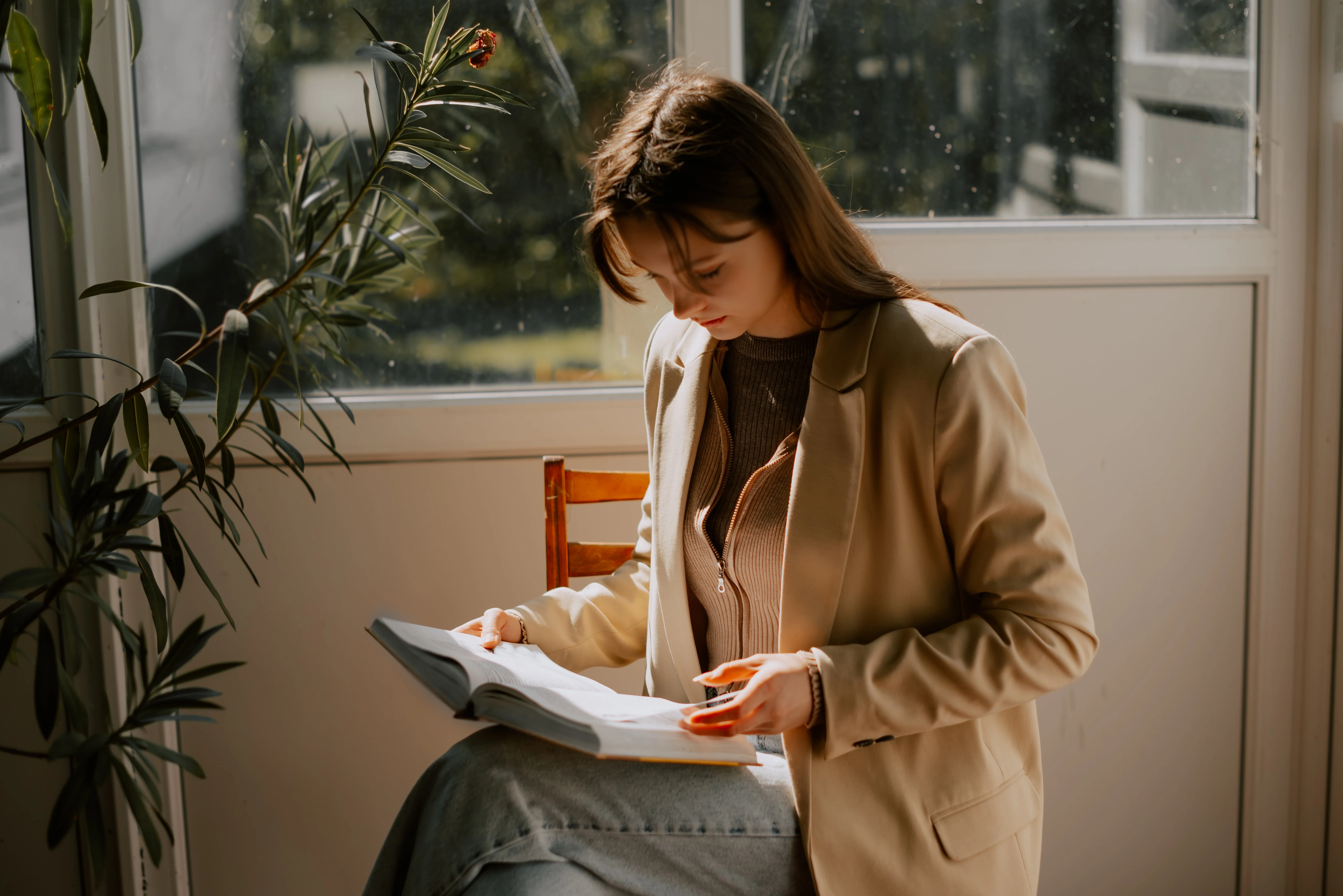 brunette studying a textbook