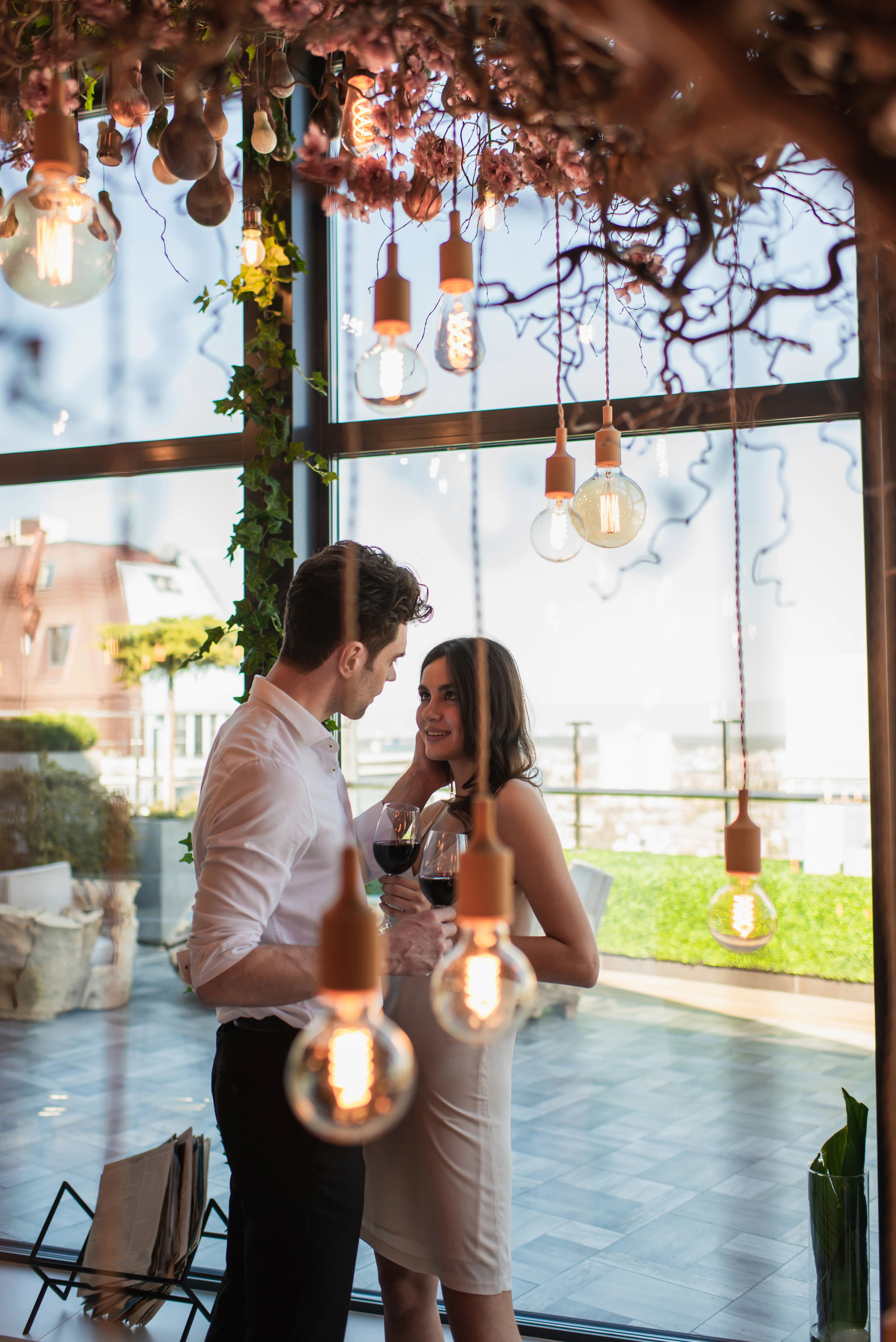 couple drinking wine at a wedding