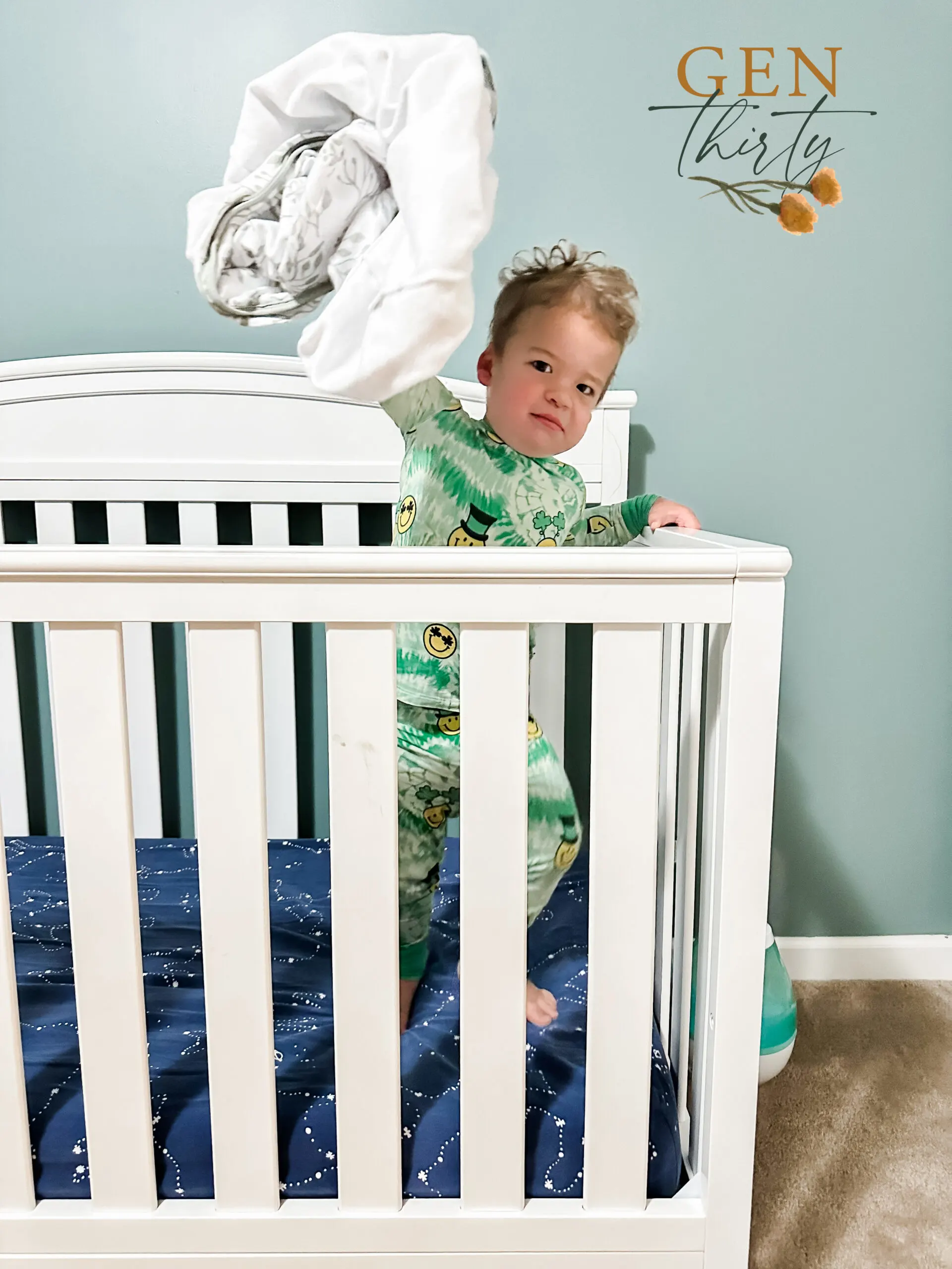toddler in his crib