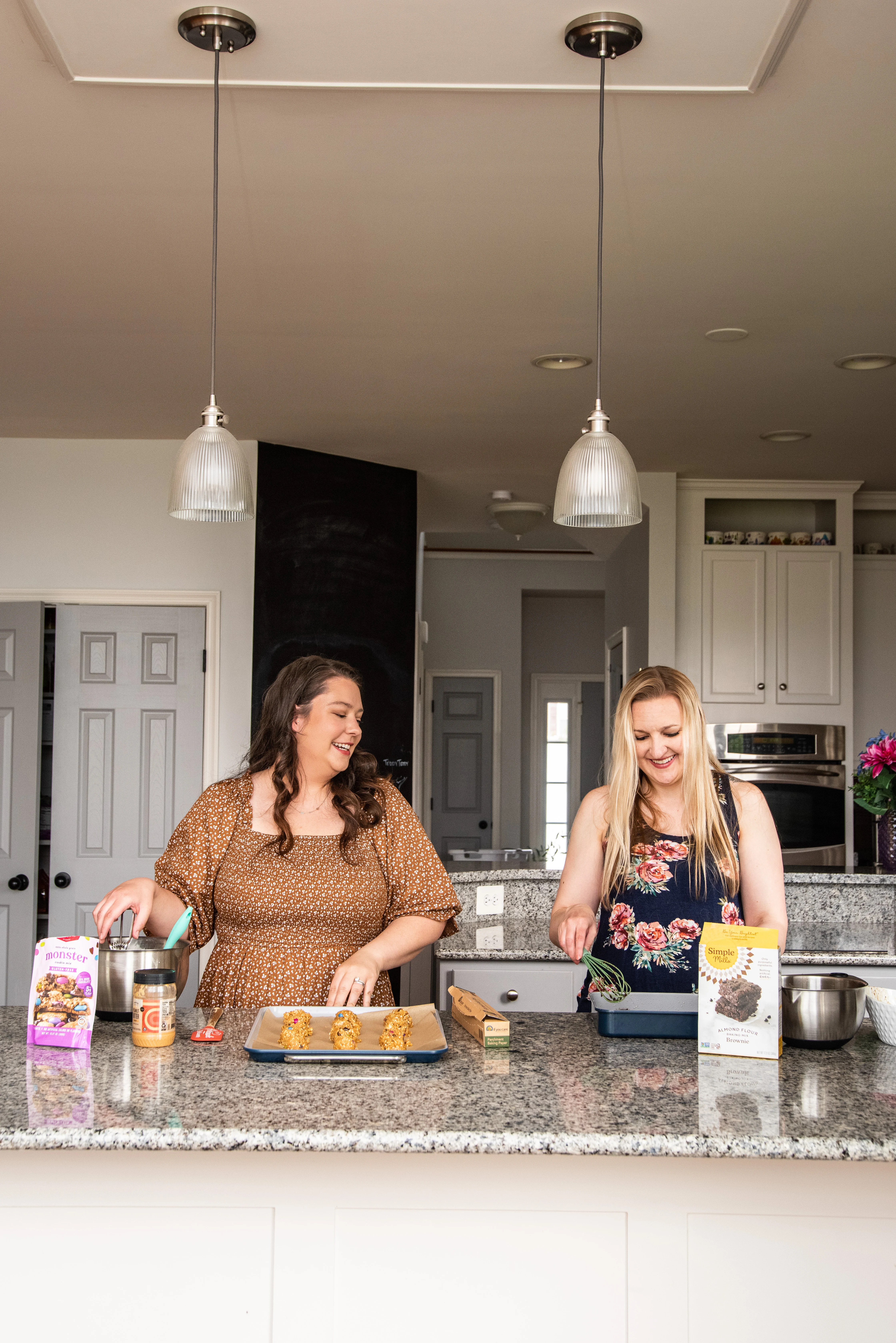 two women baking cookies