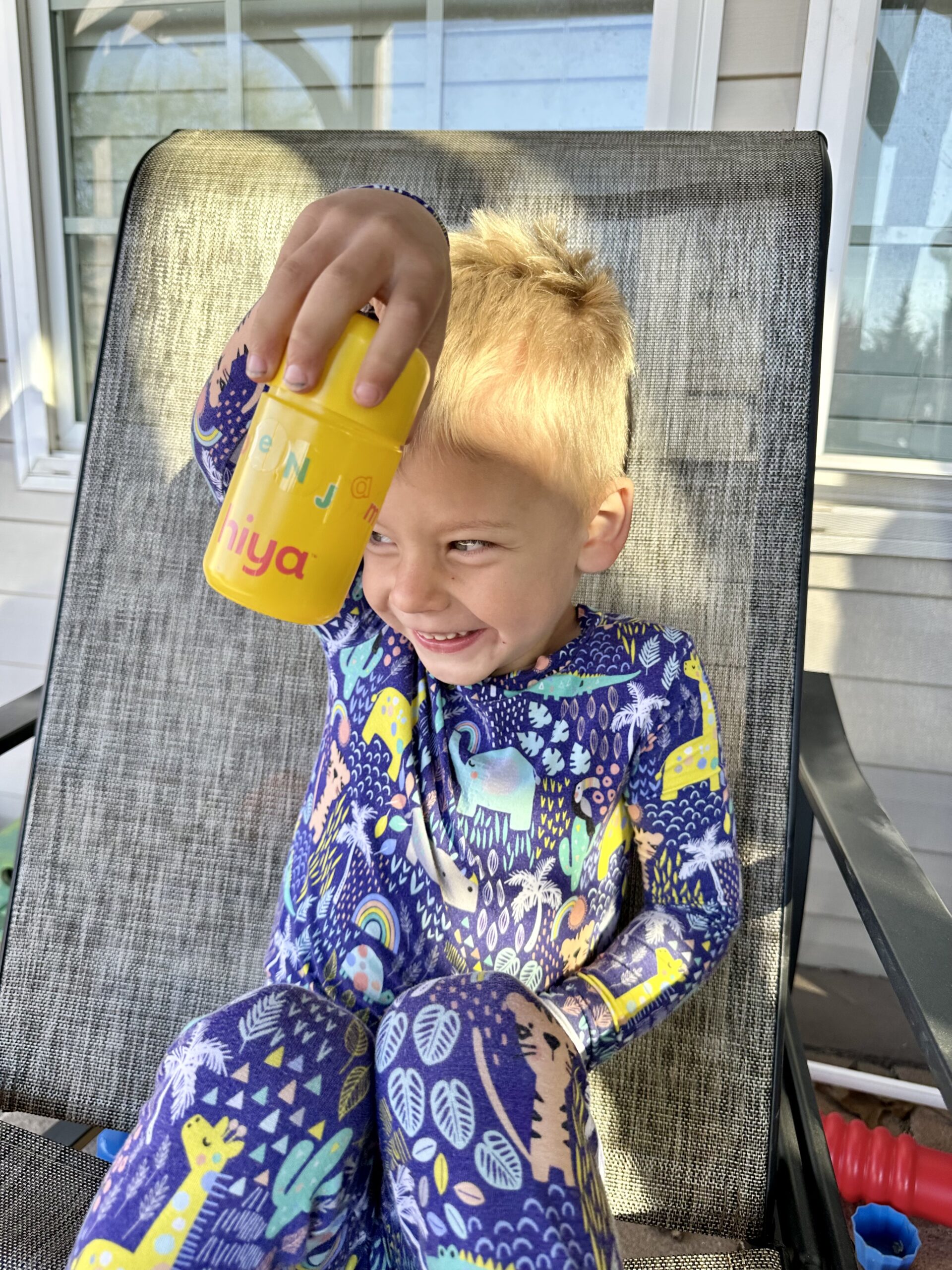 child holding a bottle vitamins