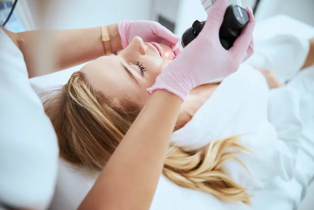 woman getting microneedling done at a salon 