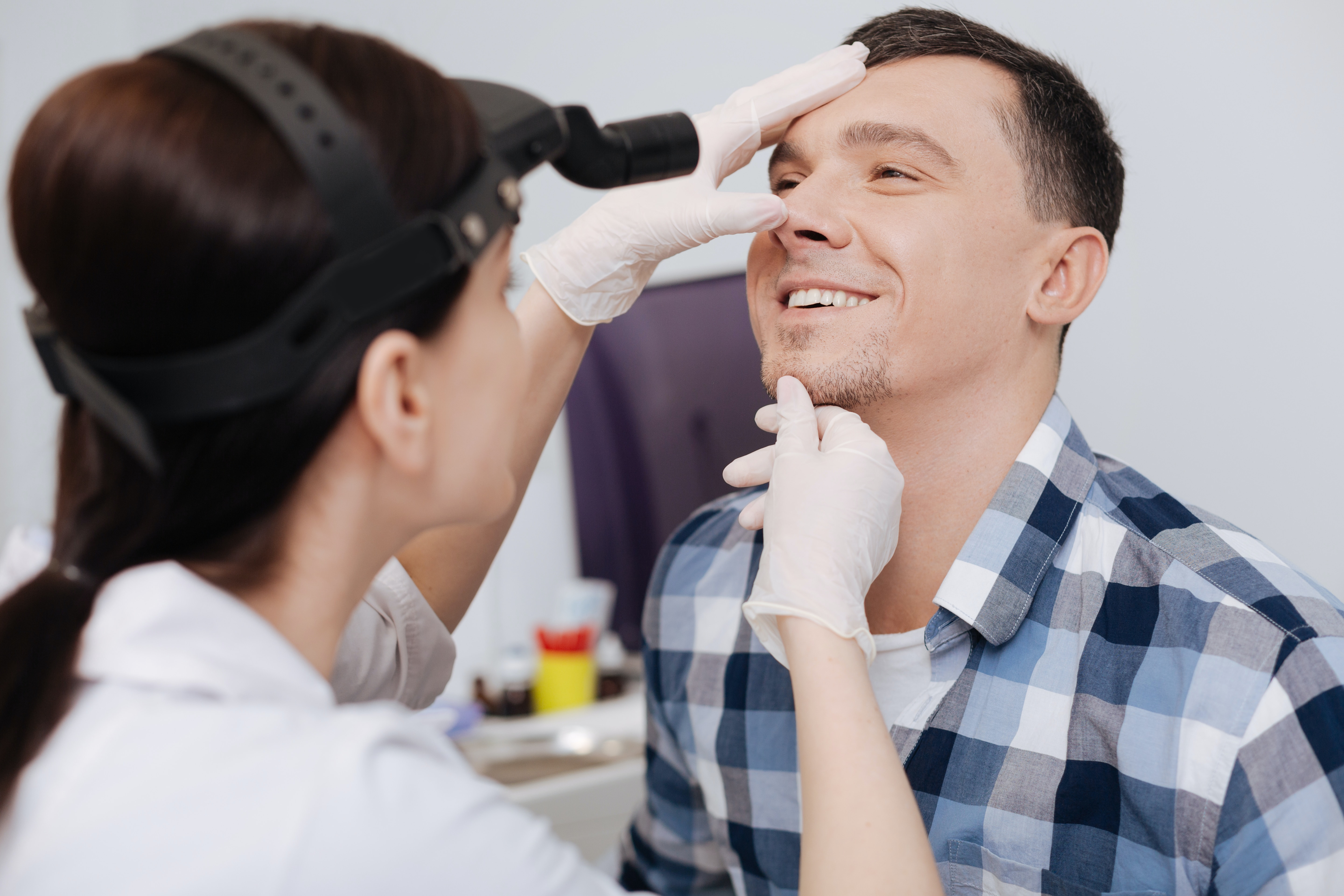 dentist examining man's mouth
