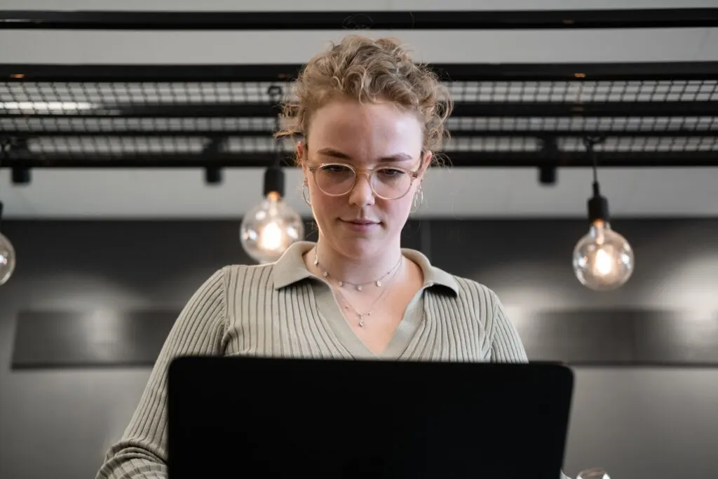 woman looking at a computer